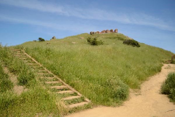 Stair-step trail on a grassy hill